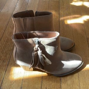 Tan vionic boots with a small heel